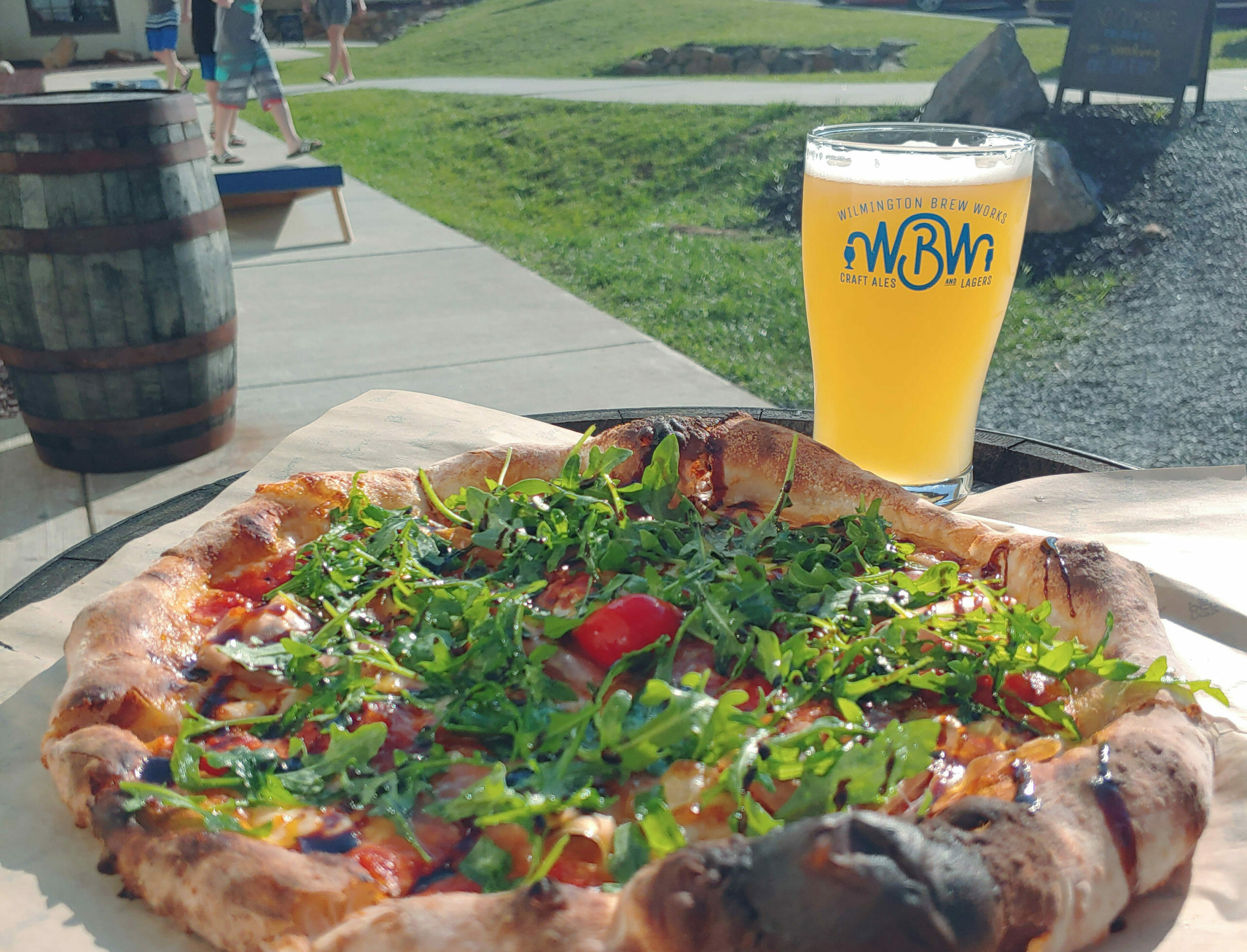 Image of brick oven pizza and WBWBEER